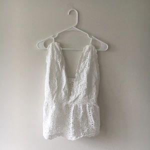 Lacey, low cut white tank